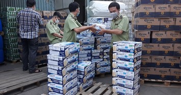 Kho hàng hoá chứa nhiều thùng sữa hiệu Ensure, bia ngoại nhập không rõ nguồn gốc ở Sài Gòn.