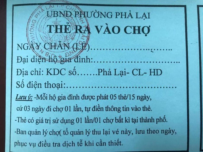 COVID-19: Nguoi dan TP Chi Linh duoc phat the 3 ngay di cho 1 lan