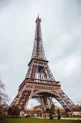 Vi sao thap Eiffel cua Phap bong dung cao them 6m?-Hinh-7